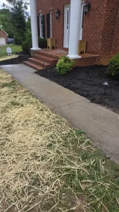 Completed foundation repair in Daleville, VA showing the stabilized front porch after helical pier installation by Sure-Dri Basement Waterproofing.